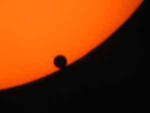 Image of silhuoette of Venus against the disk of the sun.